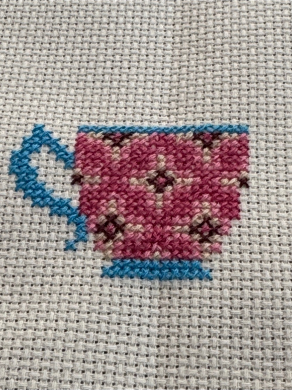 Hand-Embroidered Pink Teacup Cross Stitch